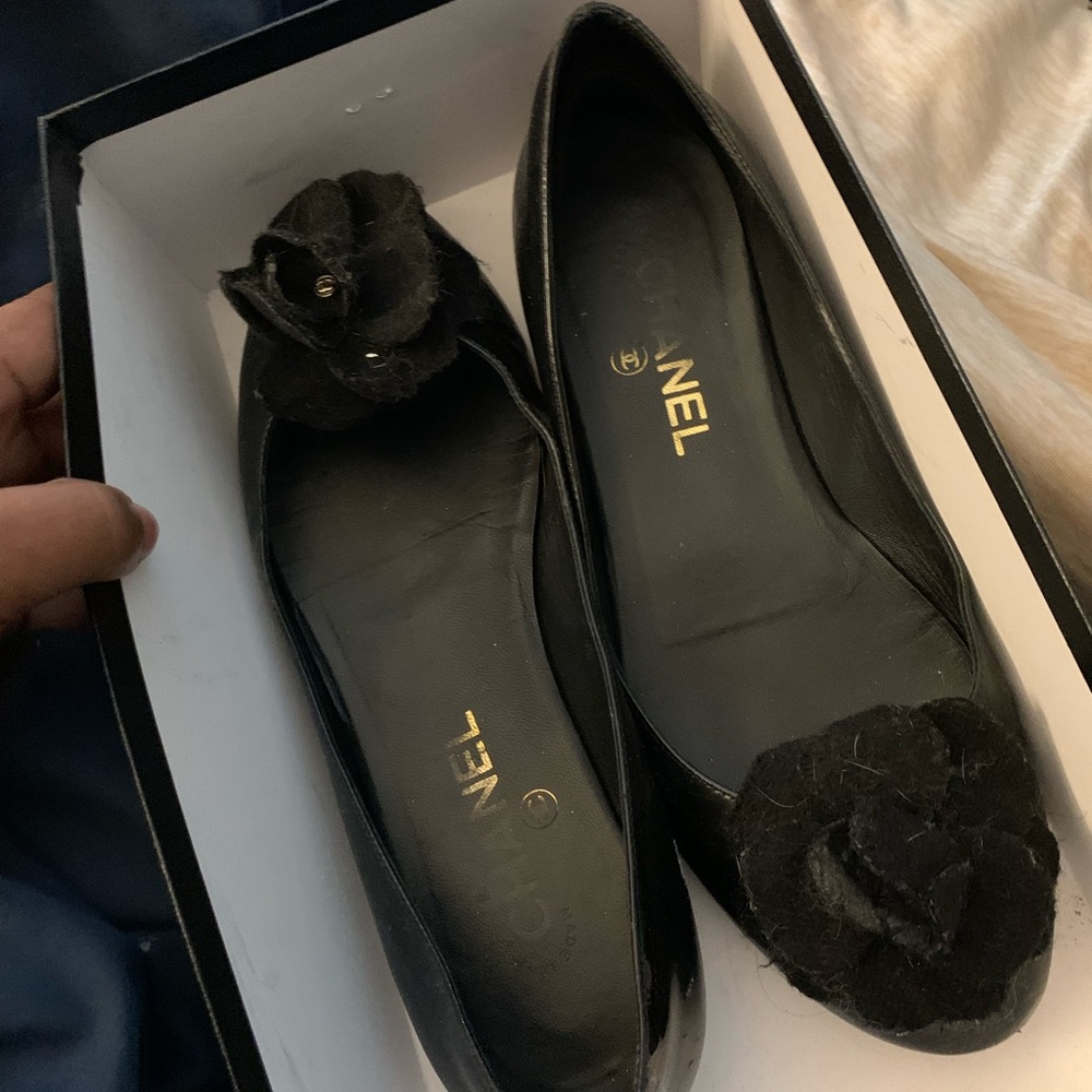 Chanel black flower slip ons